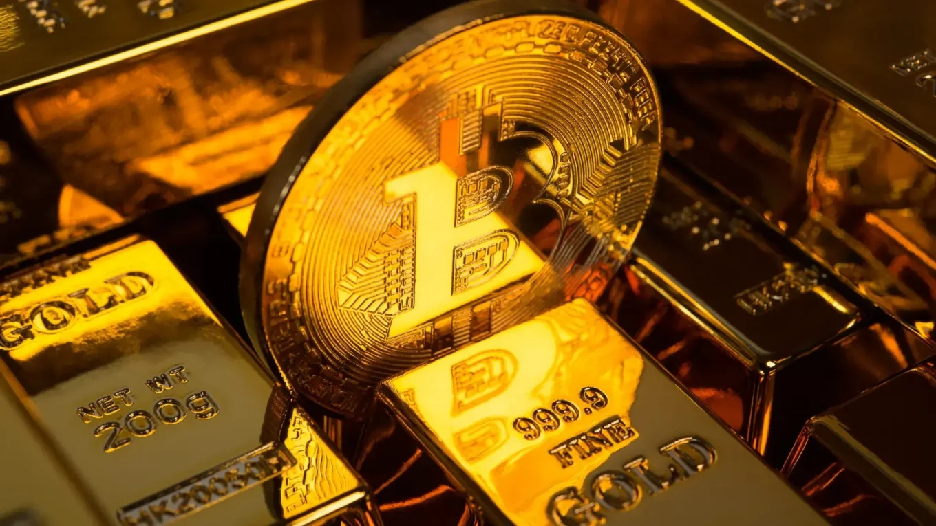 Bitcoin and gold coins side by side, symbolizing the comparison between Bitcoin as digital gold.